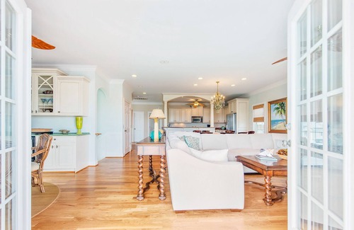Sunset Beach Cottage | Newly redecorated ocean views, 3 stop elevator, swimming pool deep water canal.