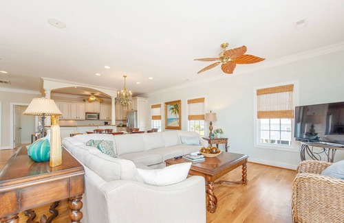 Sunset Beach Cottage | Newly redecorated ocean views, 3 stop elevator, swimming pool deep water canal.