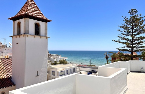 Armacao de Pera Apartment | Newly refurbished coastal apartment, steps away from the beach with sea views.