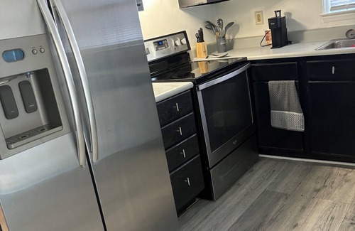 Greensboro House | Newly Remodeled 3 Bedroom Home. Near Universities, Furn. Market, and Coliseum.