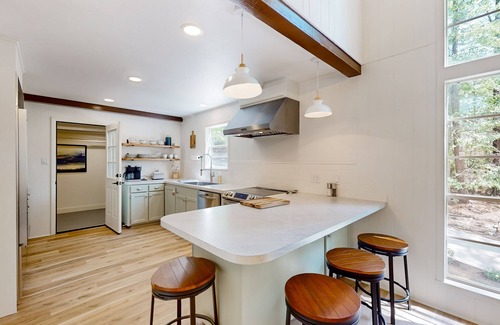 Brookeland House | Newly-remodeled & fresh dog-friendly hideaway with treetop views & firepit
