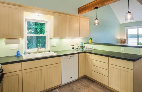 Newaygo House | Newly Renovated Lake Front Home w/ Sandy Beach