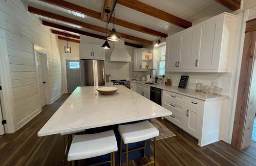 Dadeville Cabin | Newly renovated lakefront cabin at Lake Martin! Dock and boat ramp onsite!