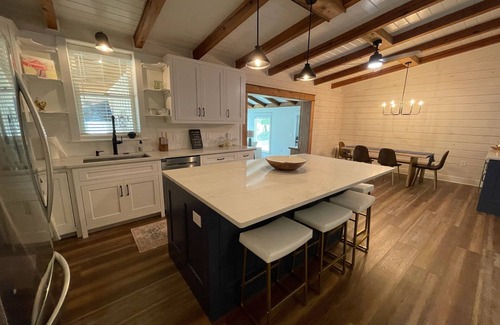 Dadeville Cabin | Newly renovated lakefront cabin at Lake Martin! Dock and boat ramp onsite!
