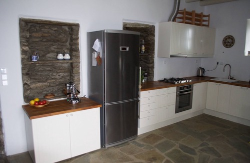 Andros House | Newly renovated stone house in olive grove with stunning sea view