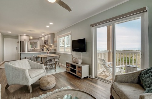 Wilmington Beach Condo | Newly Renovated Ocean Front Condo with Wrap Around Deck and Private Beach Access
