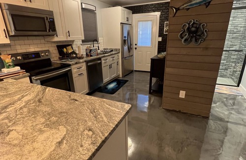 North Carolina Coast House | Newly renovated Beach House on Carolina Beach, PET FRIENDLY with BOAT PARKING!