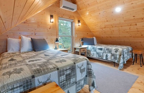 Houghton Cabin | Next to the snowmobile & recreation trails, on portage lake