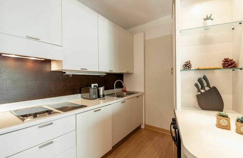 Santa Giulia Apartment | Nice apartment for 4 guests with WIFI, A/C, pool, TV and patio
