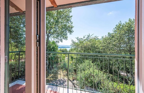 San Feliciano Apartment | Nice apartment for 4 people with WIFI, A/C, pool, TV, patio and pets allowed