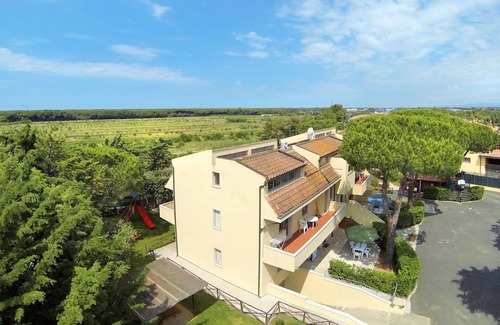 Marina di Cecina Apartment | Nice apartment for 6 people with pool, A/C, WIFI, TV, patio and pets allowed
