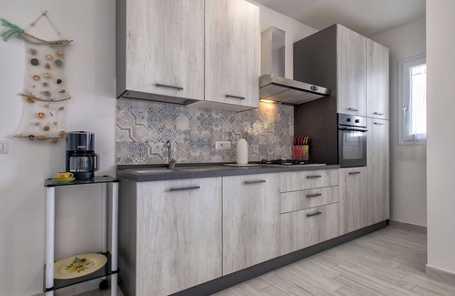 La Muddizza Apartment | Nice apartment for 6 people with A/C, pool, WIFI, TV, patio and pets allowed