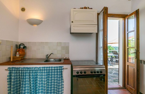 Cinigiano Villa | Nice apartment in villa for 2 guests with WIFI, A/C, pool, patio, panoramic view and parking