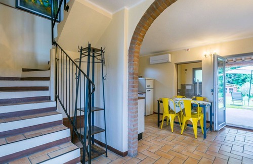 Castagneto Carducci Villa | Nice apartment in villa for 5 guests with pool, A/C, WIFI, patio, pets allowed and parking