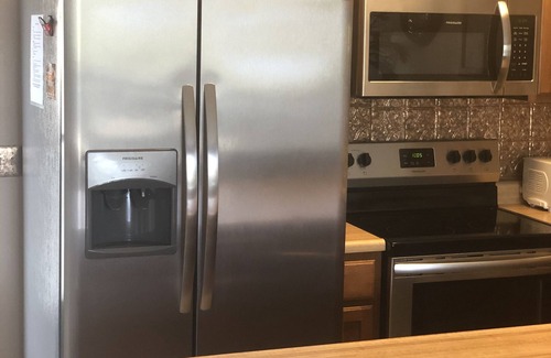 Village of Four Seasons Condo | NO EXTRA FEES. LakeFront with view of channel. Slip Included.