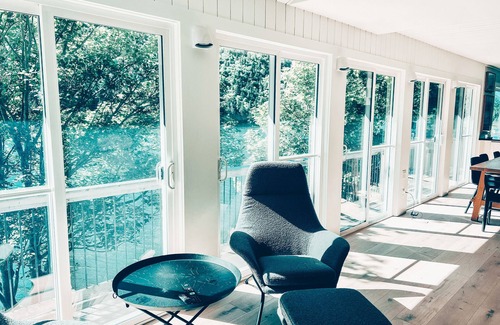 Clarke's Beach Cottage | Nordic Style Private Riverfront Cottage with Heated Pool & Hot Tub