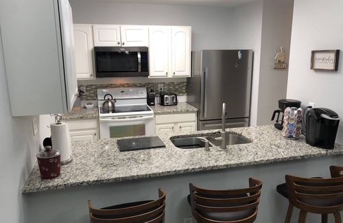Surf City House | Not quite ocean front, but almost! Just a few steps to the sand! Pet friendly.