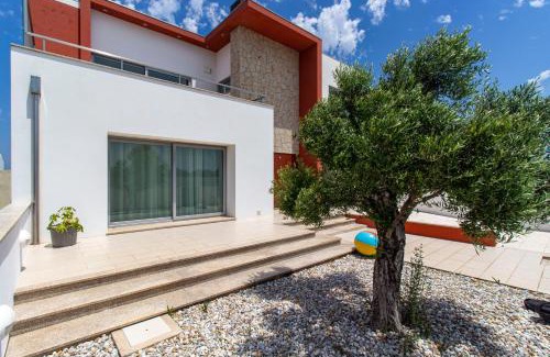 Torreira House | O CANTINHO ENTRE A RIA E O MAR - with hot water pool all year round