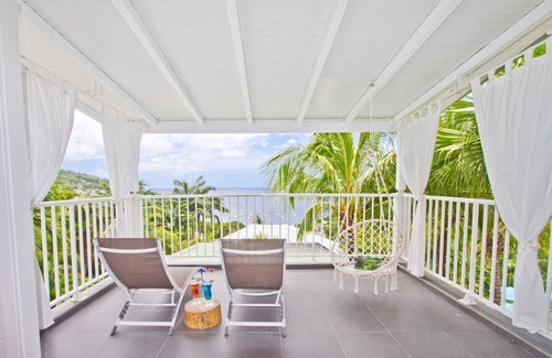 Deshaies Apartment | "O Coeur de Deshaies", Grande Anse. Sea view, swimming pool, air conditioning.