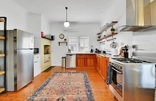 Orange House | Oasis on Warrendine - Sleek & Stylish Abode