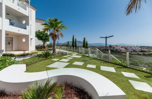 Manilva Apartment | Oasis with terrace and sea view 2BR, garden & pool