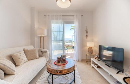 Manilva Apartment | Oasis with terrace and sea view 2BR, garden & pool