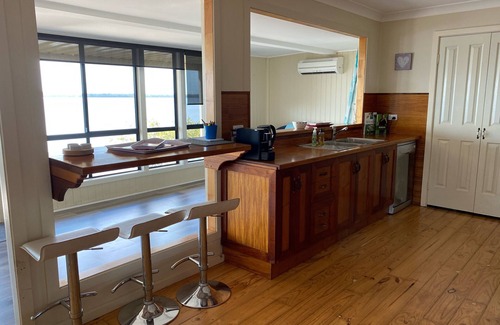 Brisbane Waterfront House | Ocean Front Paradise. Fish off the Deck.