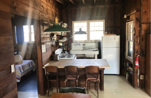 Water Island House | Ocean View 2BR Cottage just 100' off the expansive Fire Island ocean beach.
