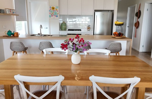 Sellicks Beach House | Ocean views, Sunset on the rear deck, Pet friendly.