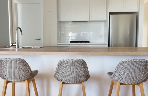 Sellicks Beach House | Ocean views, Sunset on the rear deck, Pet friendly.