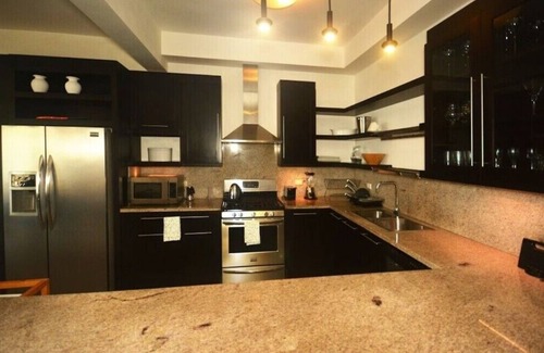 Los Brazos Condo | Oceanfront 4-bedroom Condo with WiFi and AC in lovely Sosúa