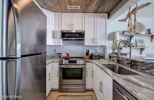 Kure Beach Condo | Oceanfront Condo With Balcony and Pool
