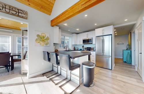 Coupeville House | Oceanfront getaway with sprawling deck, gas grill, mountain views and W/D