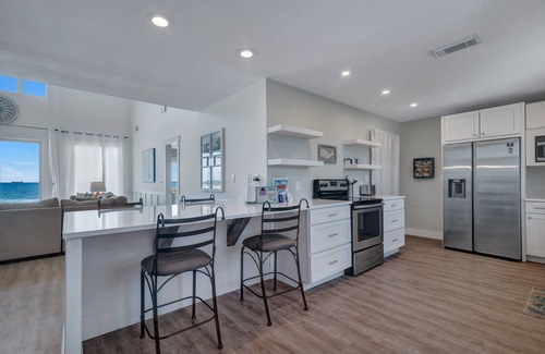 Fort Morgan House | OCEANFRONT home. Oversized deck will lead you to white sand and blue seas.