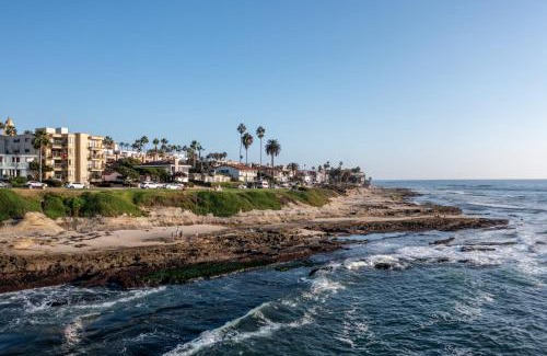 Village of La Jolla Apartment | Oceanfront in La Jolla Steps to Beach Shops Dining Dawn Patrol by AvantStay