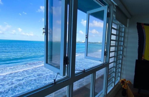 Playa Fortuna Condo | Oceanfront Paradise on Luquillo Beach 2-bedroom rooftop Puerto Rico Island