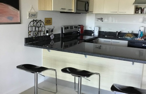 Eagle Beach Condo | Oceania One-bedroom Beachfront Paradise