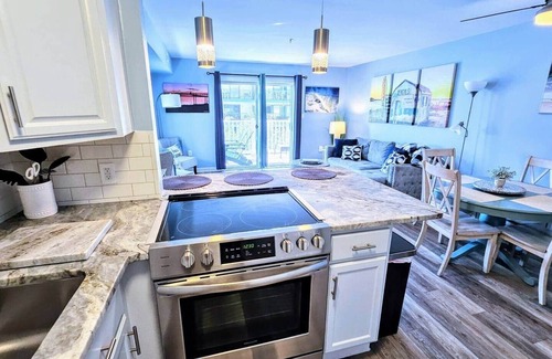 North Ocean City Apartment | Oceanside Haven -Steps to Sand + Indoor Pool + Game Rm - Perfect Beach Getaway
