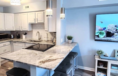 North Ocean City Apartment | Oceanside Haven -Steps to Sand + Indoor Pool + Game Rm - Perfect Beach Getaway