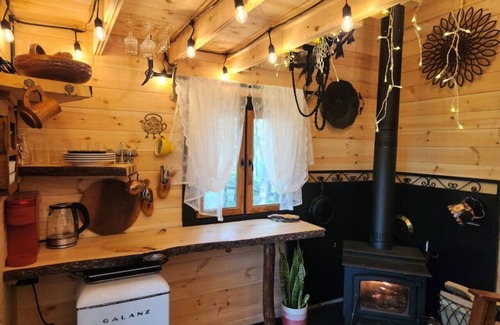 Bracebridge House | "Oda" Log Cabin with Cedar Hot Tub & Sauna on wood