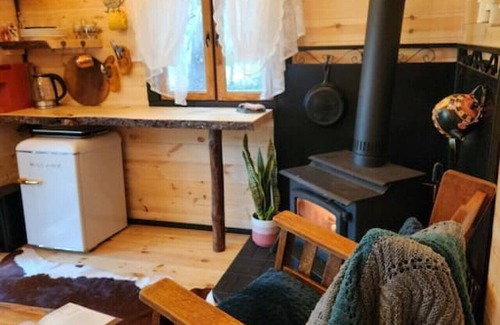 Bracebridge House | "Oda" Log Cabin with Cedar Hot Tub & Sauna on wood