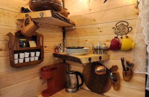 Bracebridge House | "Oda" Log Cabin with Cedar Hot Tub & Sauna on wood