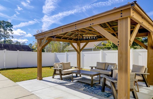Old Town Bluffton House | Old Town retreat with golf cart, fenced yard, covered porch, & outdoor living