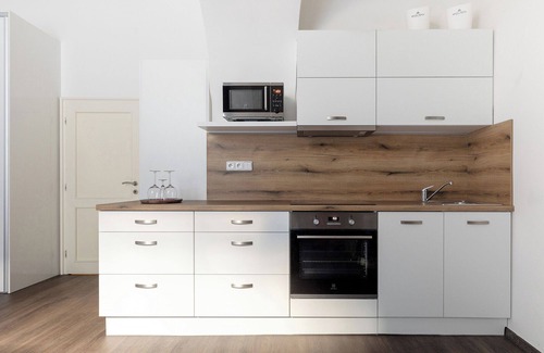 Stare Mesto House | Old Town Square Residence by Emblem