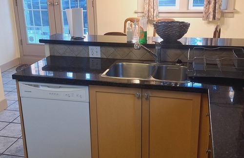Marpole House | Older 3 bedroom home, fully furnished, two minutes to Marine gateway skytrain