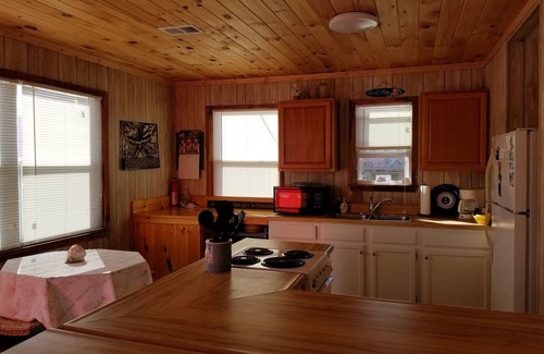 Fort Morgan Cottage | On beach living at off beach price! Dog friendly.