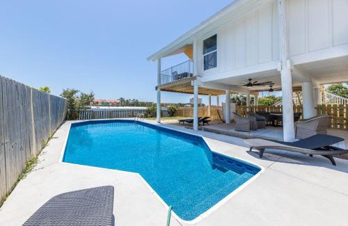 Ono Island Villa | On the Canal at Perdido Key Splash in the private pool and relax by the canal