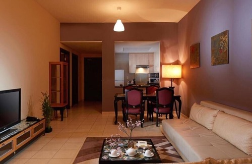 Discovery Gardens Hotel | One Bedroom Apartment In Discovery Gardens By E R