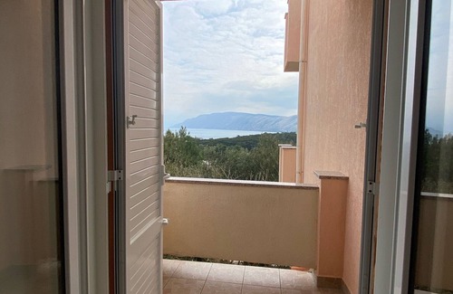Lopar Apartment | One bedroom apartment with balcony and sea view Lopar, Rab (A-23747-c)