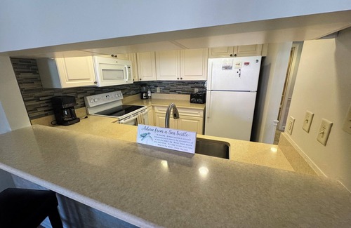 Shelter Cove Condo | One bedroom Harbourside Villa in Shelter Cove Harbour - pool and spa